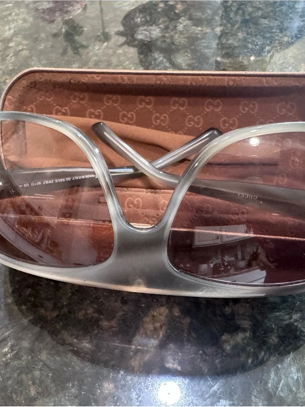 Gucci Clear Frame Sunglasses with Brown Gradient Lenses